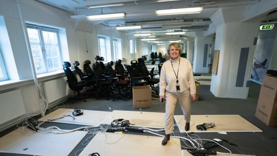 Kristin Viker Aanensen ser fram til at NTB og Fagpressen kan samarbeide om alle de trykte bladene som kommer til å få en flott eksponering i Pressens hus. Her er hun fotografert i det NTBs flyttelass skal gå fra lokalene i Oslo havnelager. (Foto: Jon Eeg, NTB).